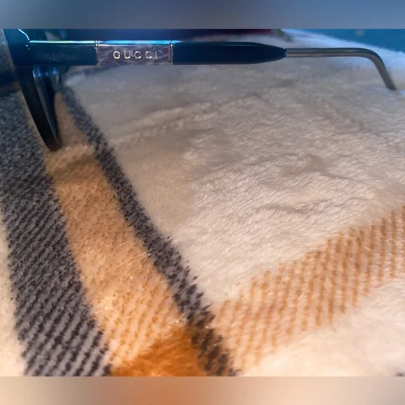 Gucci glasses with authentication card, dust bag, and case
